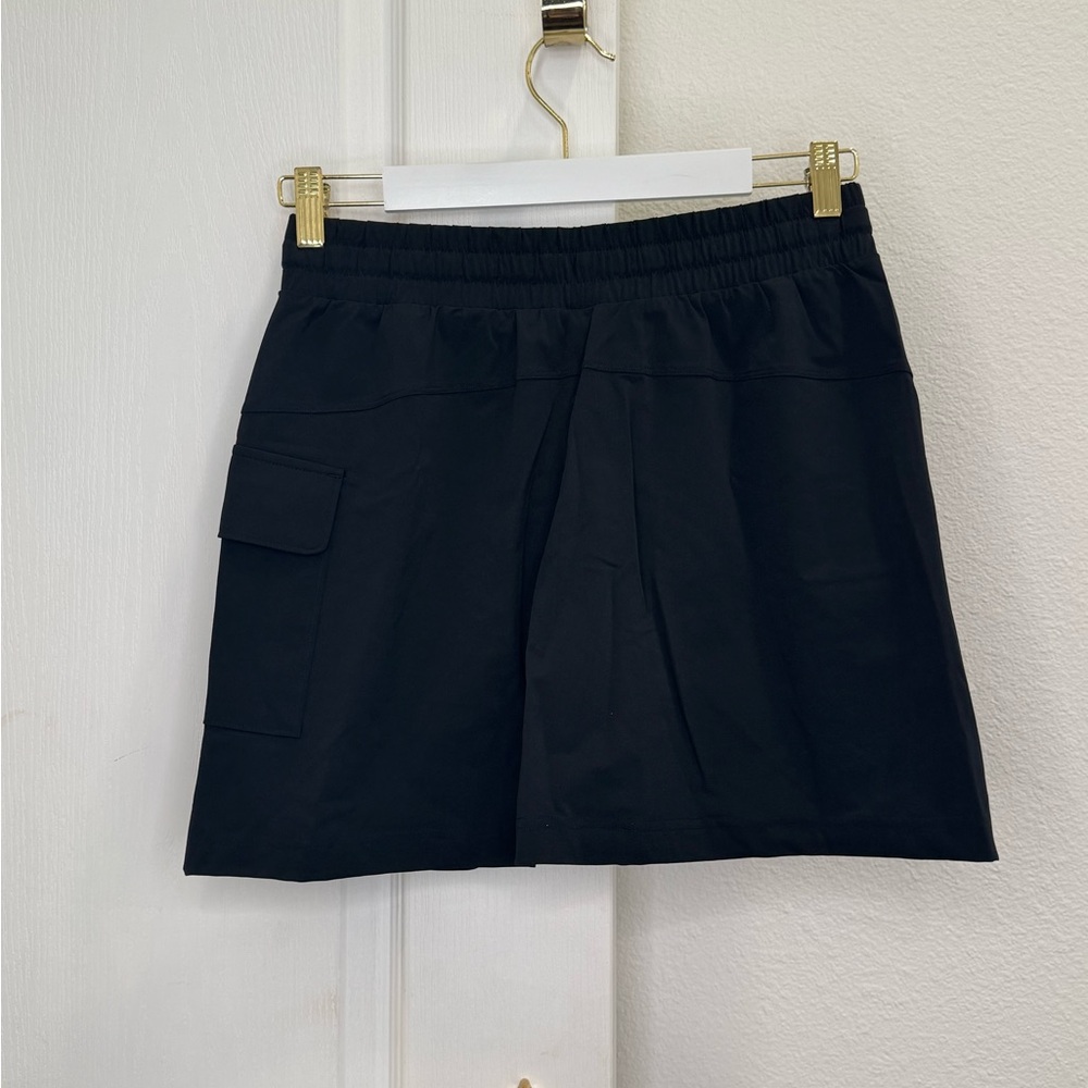 Fabletics Black Cargo Golf or Tennis Skirt with Minimalist Design